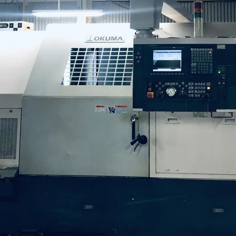 OKUMA LB35 II, NC lathe at Take Parts Factory, Toyokawa, Japan